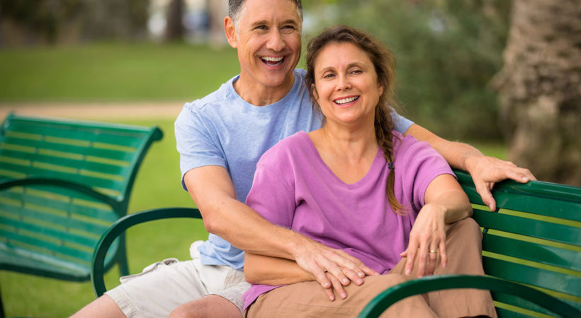 happy-middle-aged-couple-in-the-park-820x450